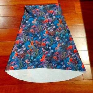 Asymmetrical hem pull on floral skirt